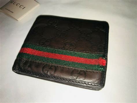 green and red stripes imprev gucci wallet|GG rubber.